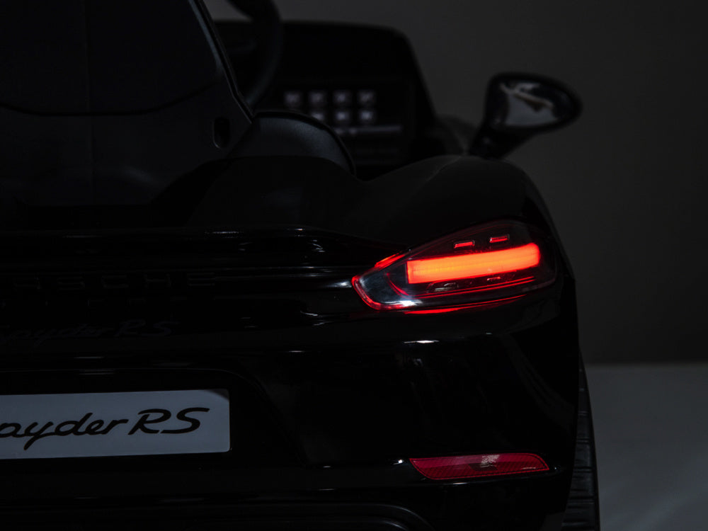 Porsche Spyder RS, 12-volt lithium battery, rubber tires, leather seat, and more!