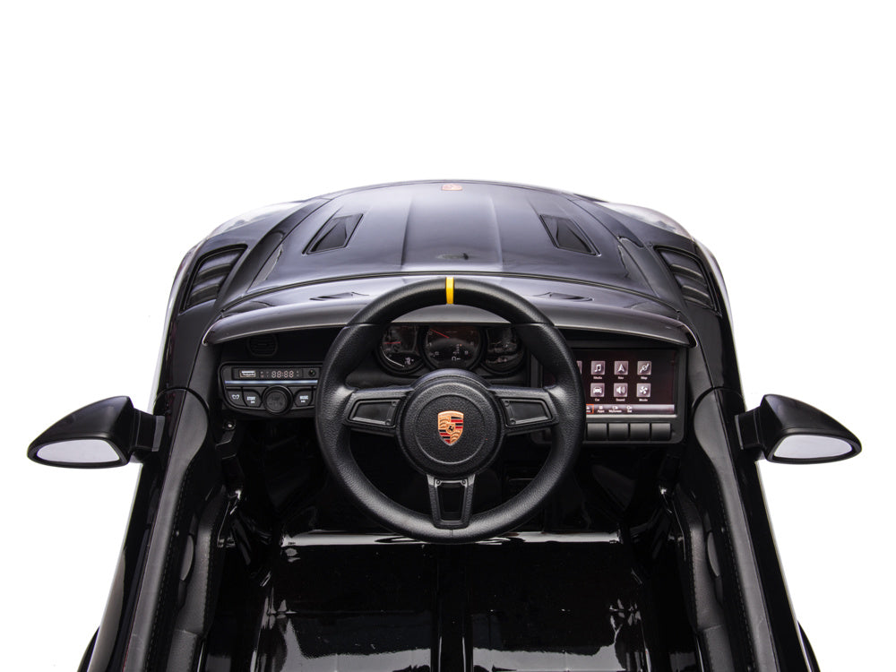 Porsche Spyder RS, 12-volt lithium battery, rubber tires, leather seat, and more!