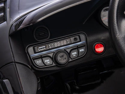 Porsche Spyder RS, 12-volt lithium battery, rubber tires, leather seat, and more!