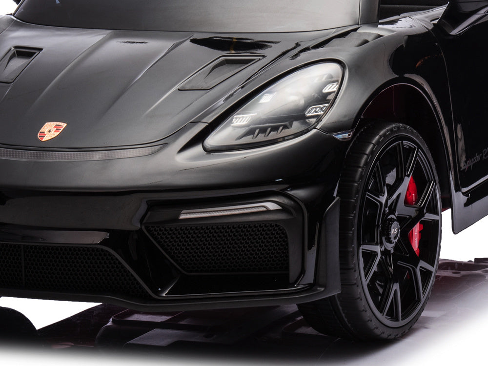 Porsche Spyder RS, 12-volt lithium battery, rubber tires, leather seat, and more!