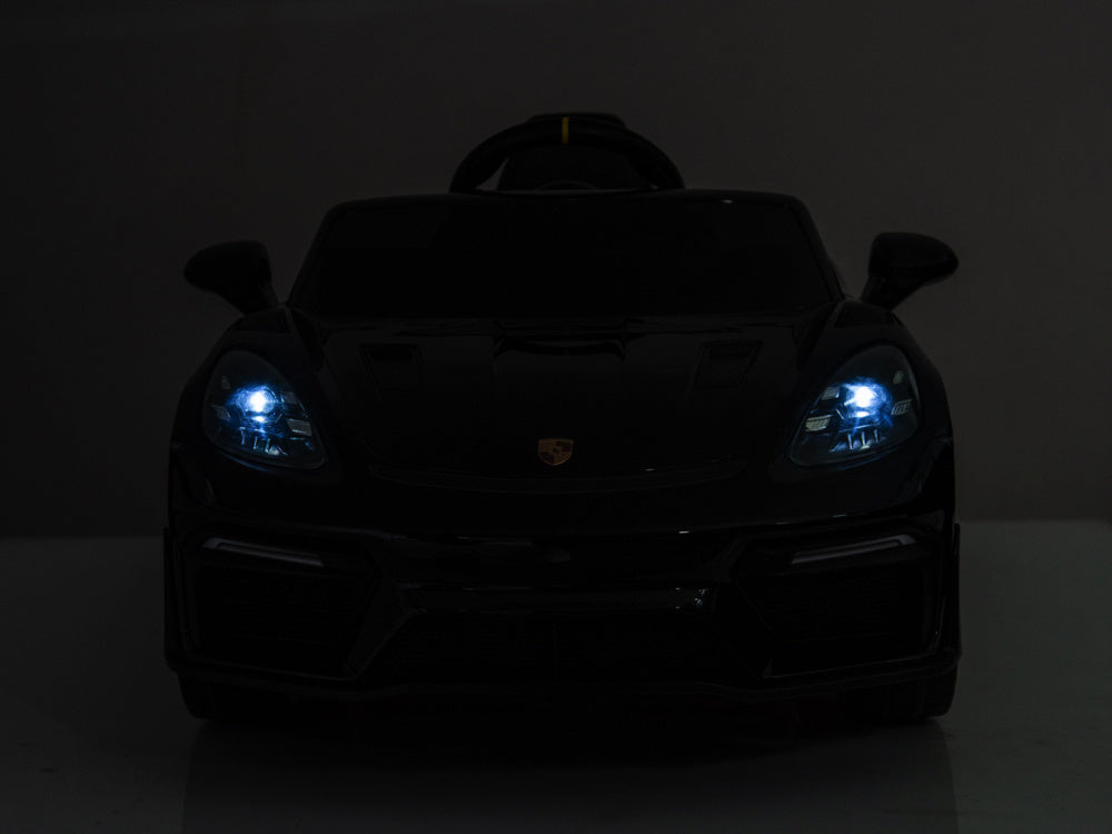 Porsche Spyder RS, 12-volt lithium battery, rubber tires, leather seat, and more!