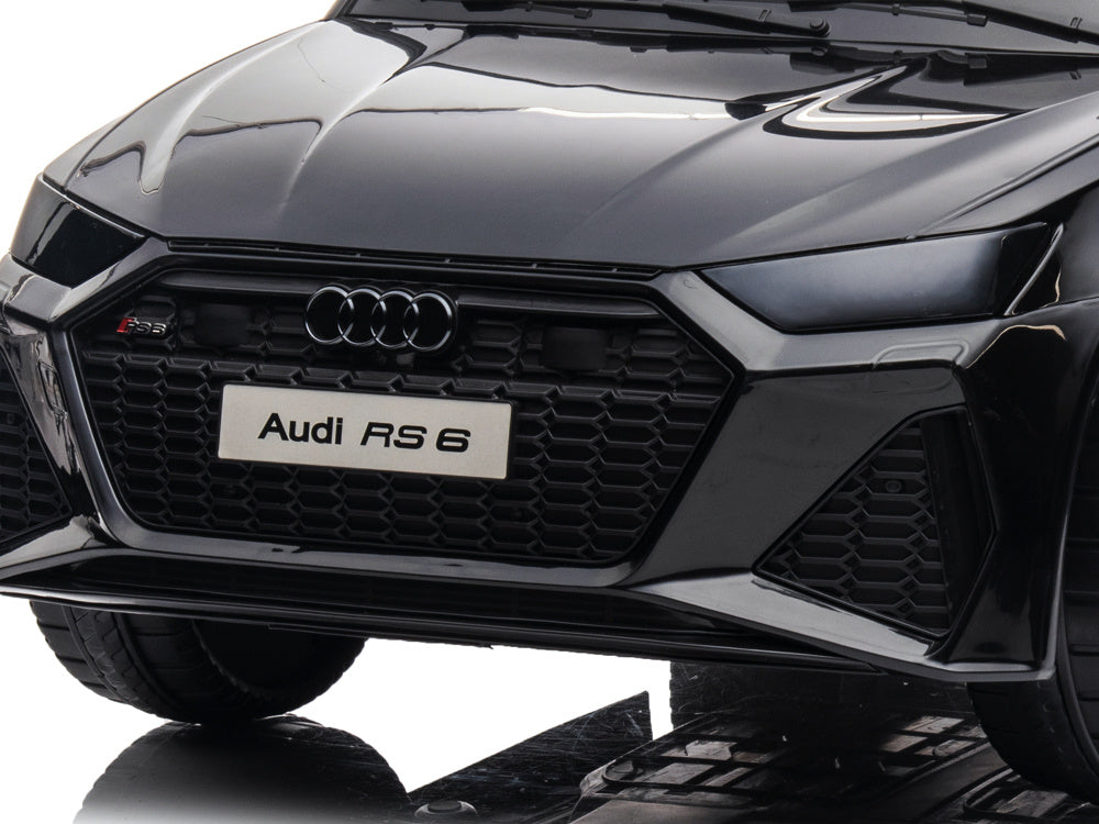 Audi RS6, 12-volt electric children's car with rubber tires, leather seat, and more!